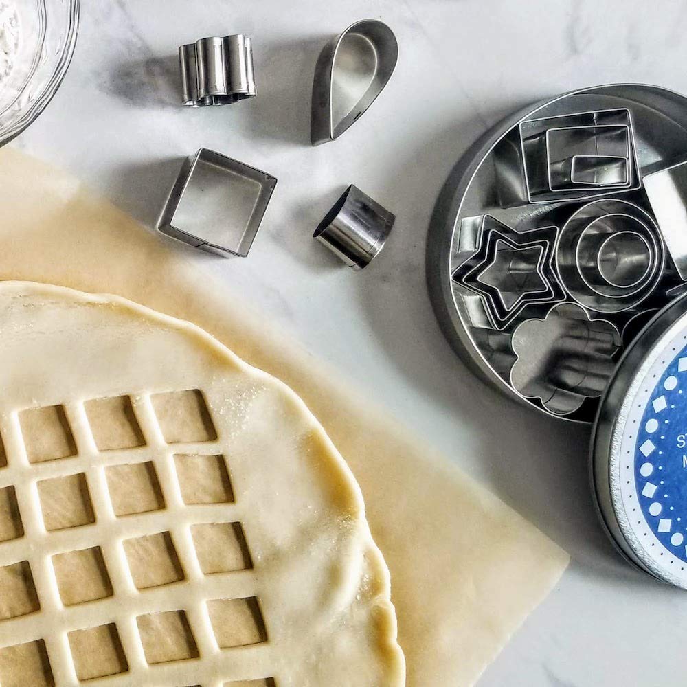 Ultra Cuisine dough and fondant cutters in action for decorative designs.