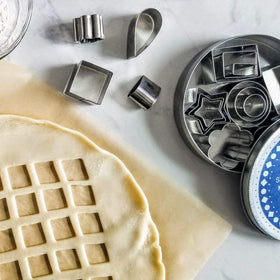 Ultra Cuisine dough and fondant cutters in action for decorative designs.