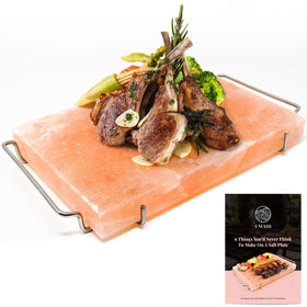 UMAID Himalayan salt block on stainless steel tray for grilling and serving.