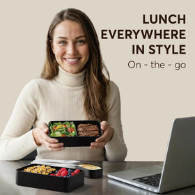 Umami Bento Box with four utensils, ready for on-the-go meals.