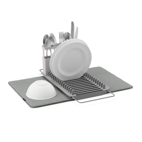 Umbra UDry over-sink dish rack with expandable arms for flexible sink fit.