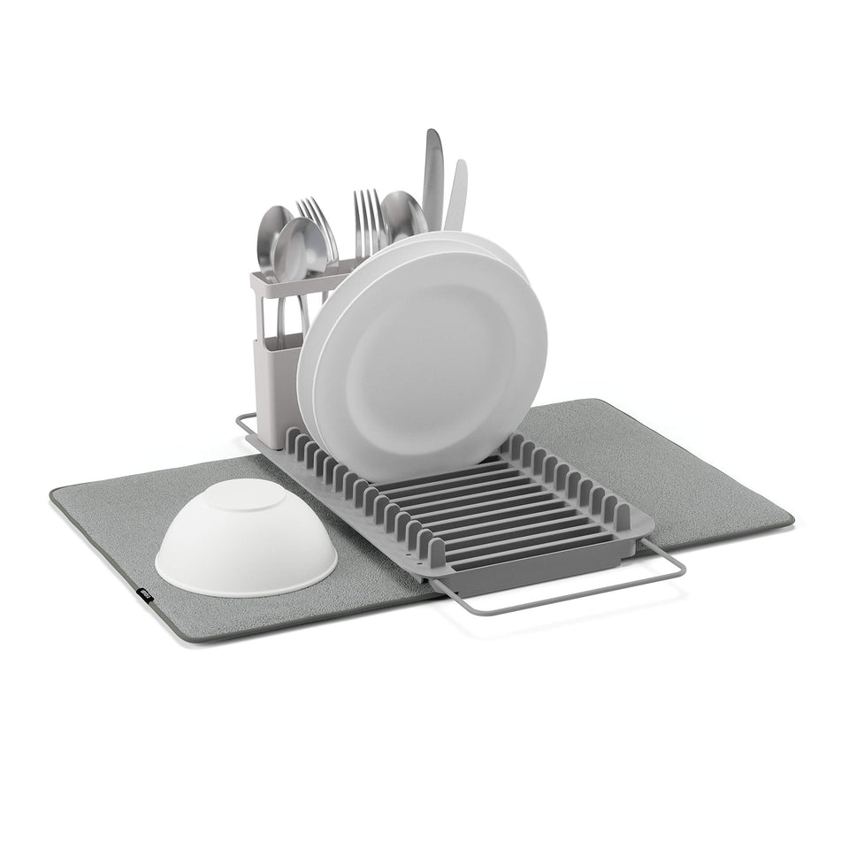 Umbra UDry over-sink dish rack with expandable arms for flexible sink fit.