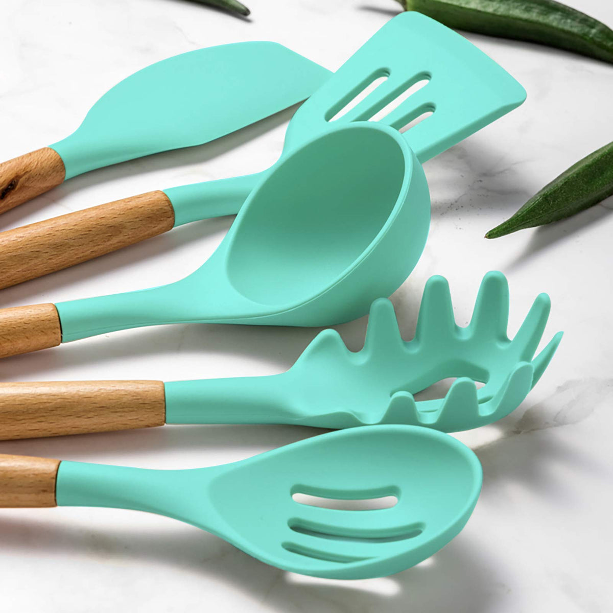 Umite Chef silicone heads resist high heat to protect cookware surfaces.