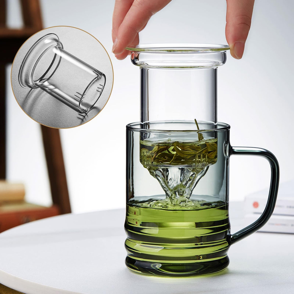 Unbreakable glass tea cup infuser in use for loose leaf tea