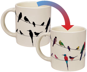 The Unemployed Philosophers Guild Birds on a Wire mug reveals colorful bird silhouettes when hot