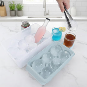 Unigul 2.5-inch round ice balls in a sturdy tray for cocktails.