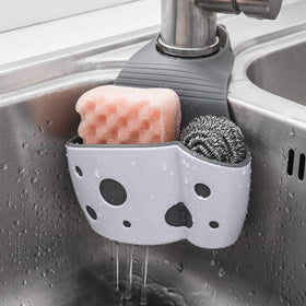 UNIKON 2-pack sink caddy on faucet keeps sponges neatly organized.