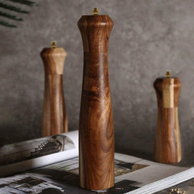 UNIOVC wooden pepper grinder displayed on a dining table
