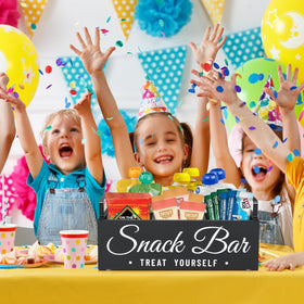 Unistyle 4-compartment snack organizer showing separate sections for bars, candy, and drinks.
