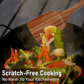 Unokit spoon holder with drainage hole keeps tools dry and accessible.