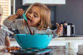 UpGood dishwasher-safe silicone spatula, convenient cleanup after cooking.