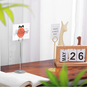 Urban Deco birthday party decor stand gold enhances centerpieces and messages.