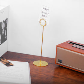 Urban Deco gold photo-card holder displays photos and signs stylishly.