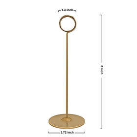 Urban Deco restaurant-table marker gold guides guests to seats.