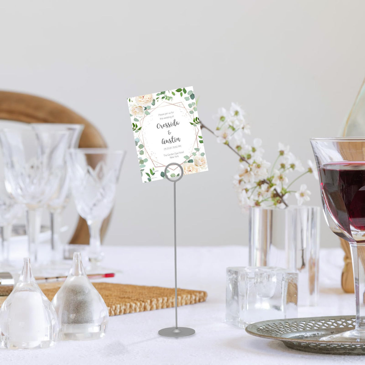 Urban Deco gold wedding table stand adds elegant sign display.