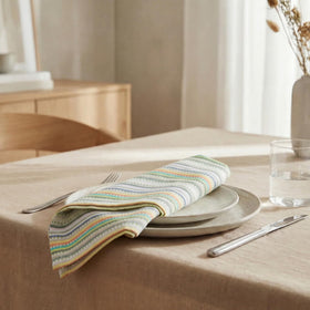 Urban Villa napkins on elegant dining set for refined table presentation