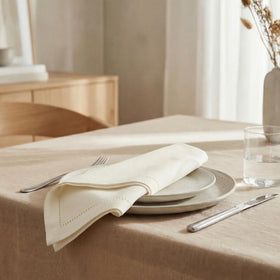 Urban Villa folded-napkins dining-decor for chic table setup.