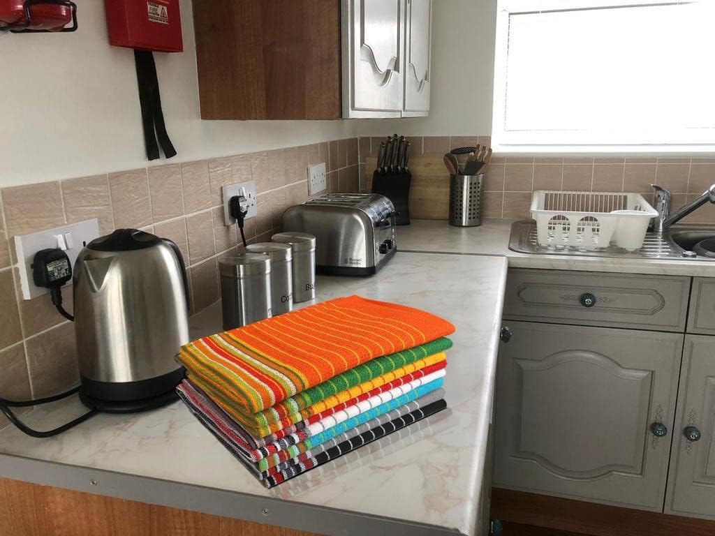 Urban Villa 20x30 inch towels cover large dishes for efficient drying.