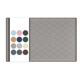 URMONA under-sink mat folded, protecting cabinets from spills.