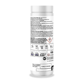 Urnex Cafiza dosing spoon demonstrates easy powder measurement