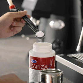 Valves and lines being cleaned with Cafiza for better flow