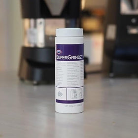 Kitchen scene with Urnex cleaner for routine care.