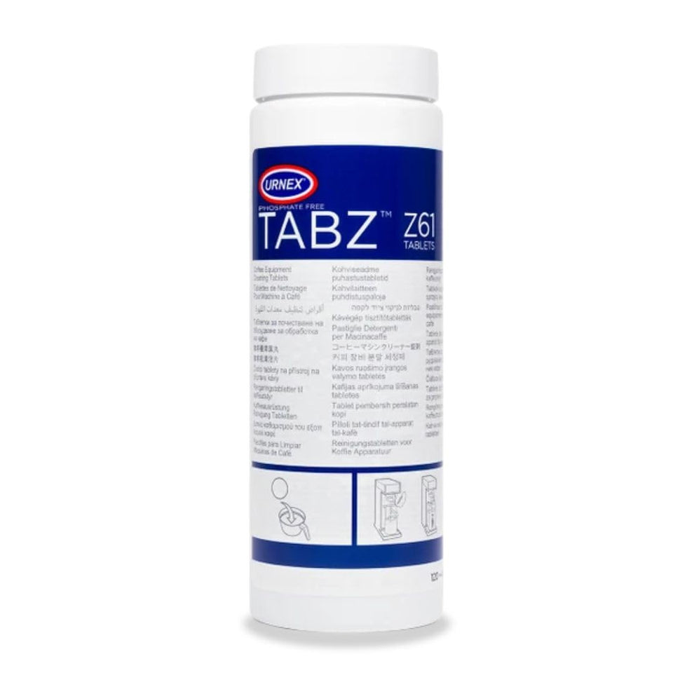 Urnex Tabz tablets in bottle demonstrate convenient one-step cleaning for coffee equipment.