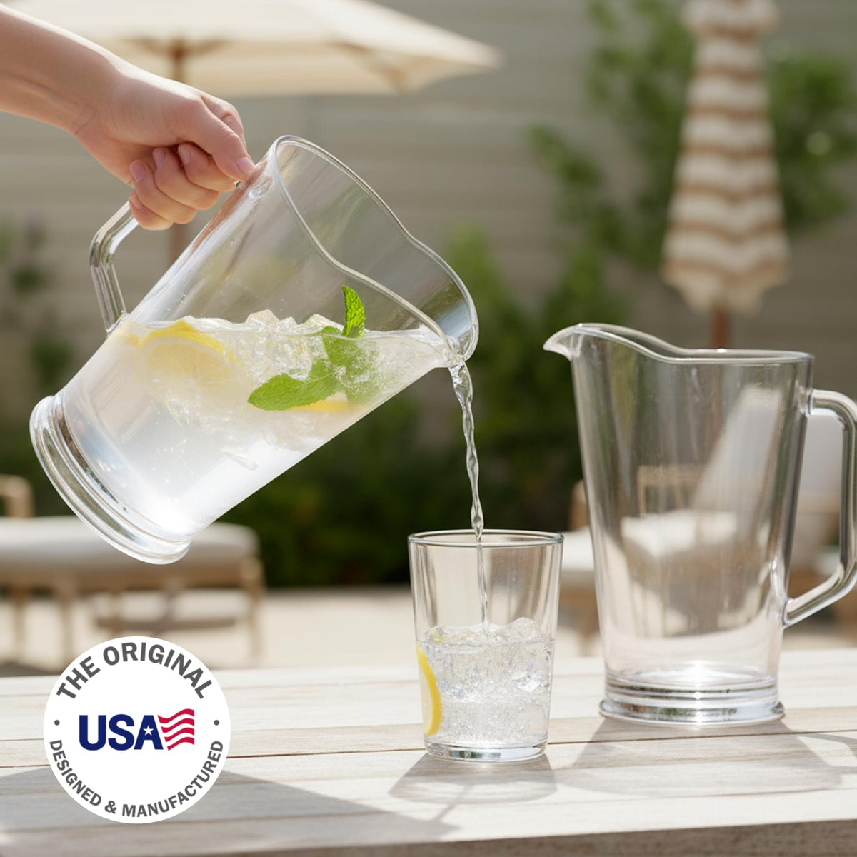 US Acrylic 64oz Bistro Pitcher Clear showcases lemonade and water with a crystal-clear look.