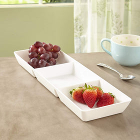 US Acrylic Avant White 15x5 trays provide room for appetizers and desserts.