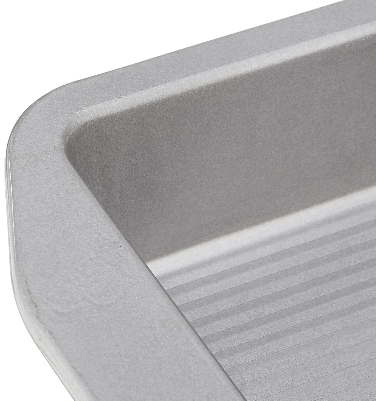 USA Pan 1120BW-3-ABC-1 square pan easy-grip handles shown for safe handling.