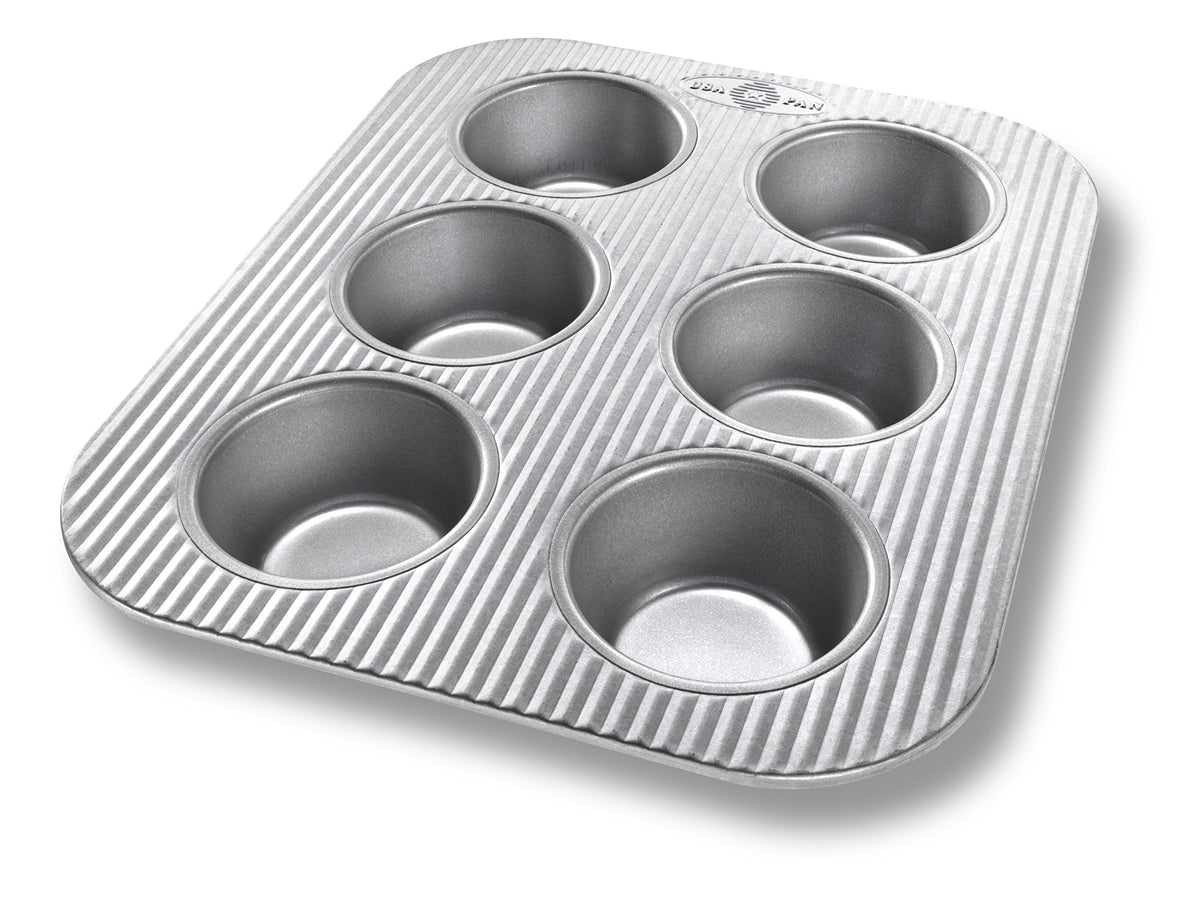 USA Pan 6-cup muffin pan in toaster oven for even baking and easy cleanup.