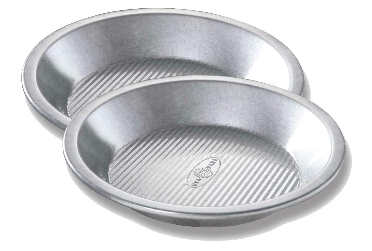 USA Pan 9-inch pie pan with corrugated surface for even baking and easy release.