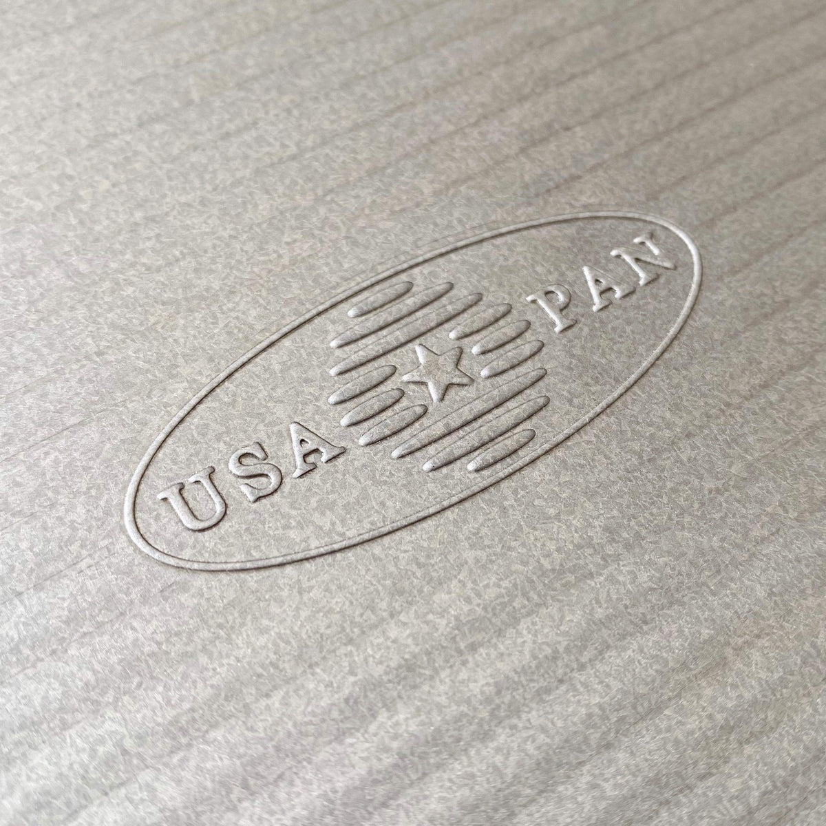 Close-up of Americoat nonstick coating on USA Pan for quick release.