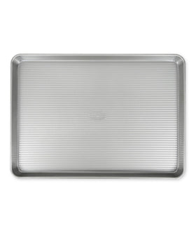 USA Pan extra large baking sheet top view with easy-release surface for large batches.