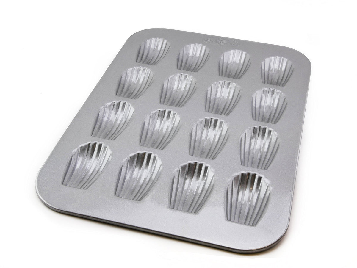 USA Pan 16-well Madeleine pan ensures even heat for uniform shells.