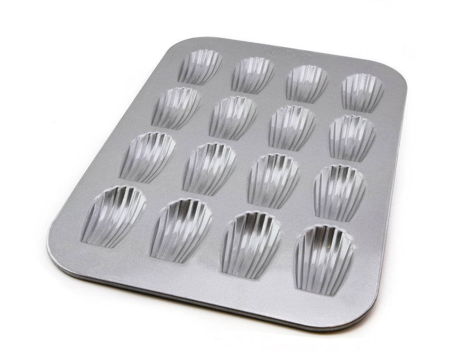USA Pan 16-well Madeleine pan ensures even heat for uniform shells.