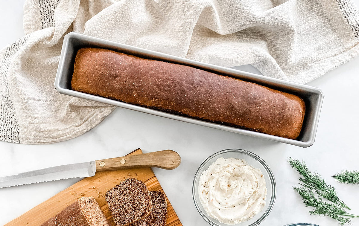 USA Pan Cocktail loaf pan with nonstick coating demonstrates easy release and cleanup.
