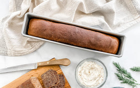 USA Pan Cocktail loaf pan with nonstick coating demonstrates easy release and cleanup.