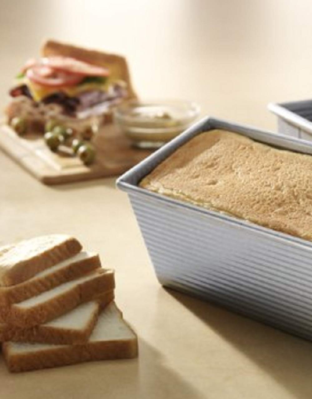 USA Pan fluted surface design promotes air circulation for uniform crust