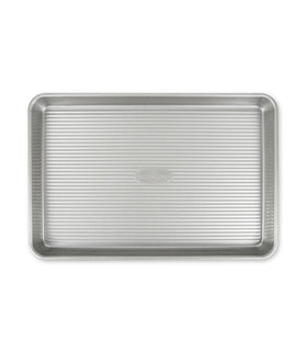USA Pan jelly roll baking sheet 14x9 with corrugated surface for even baking and easy release.