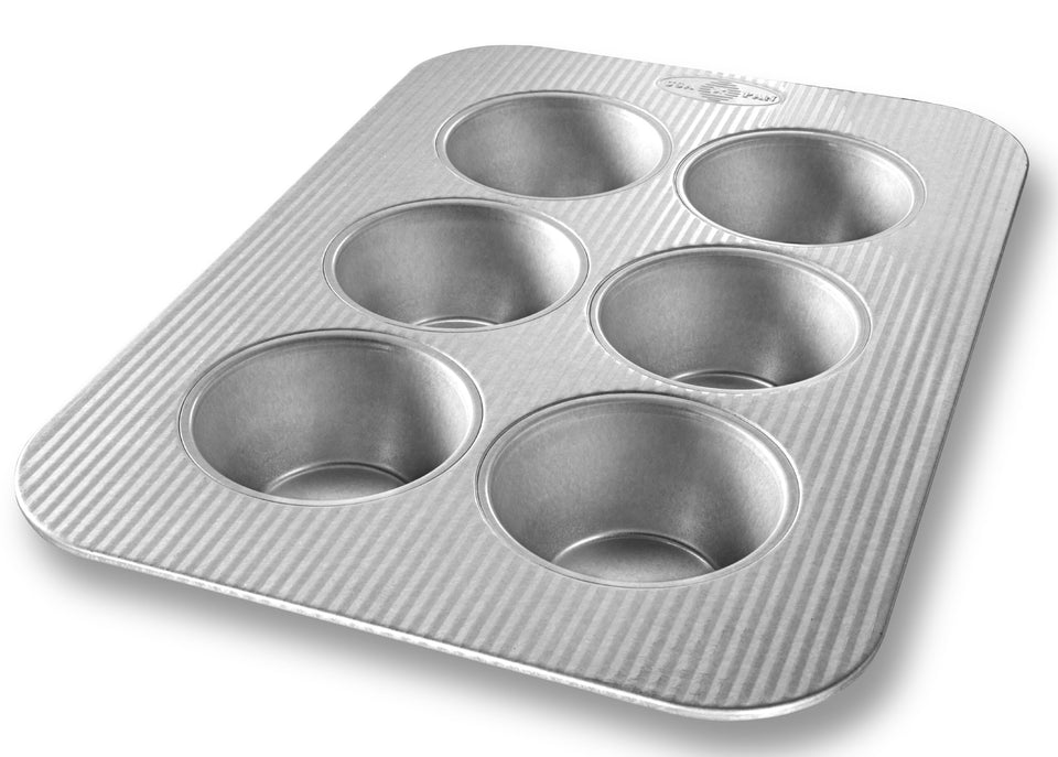 USA Pan Jumbo Texas Muffin Pan with 6 wells for evenly baked muffins.