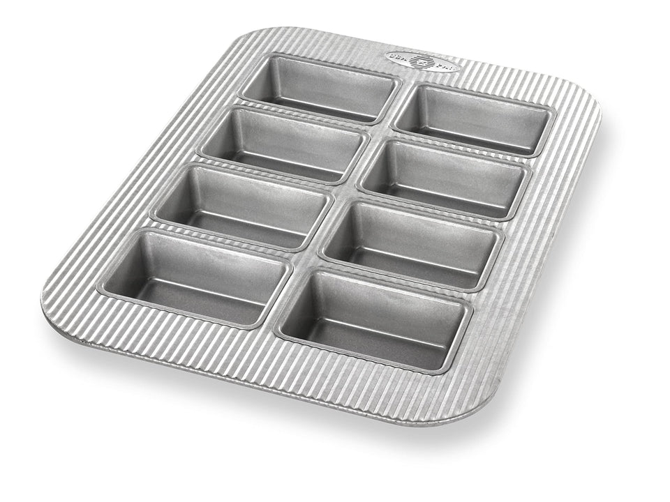 USA Pan mini loaf pan with 8 wells and evenly baked loaves.