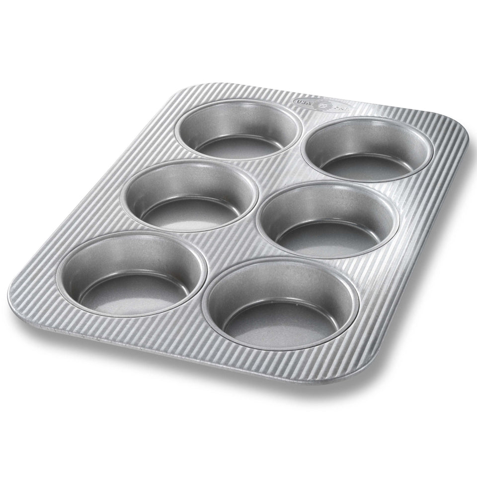 USA Pan mini round cake pan top view with six wells for even mini treats