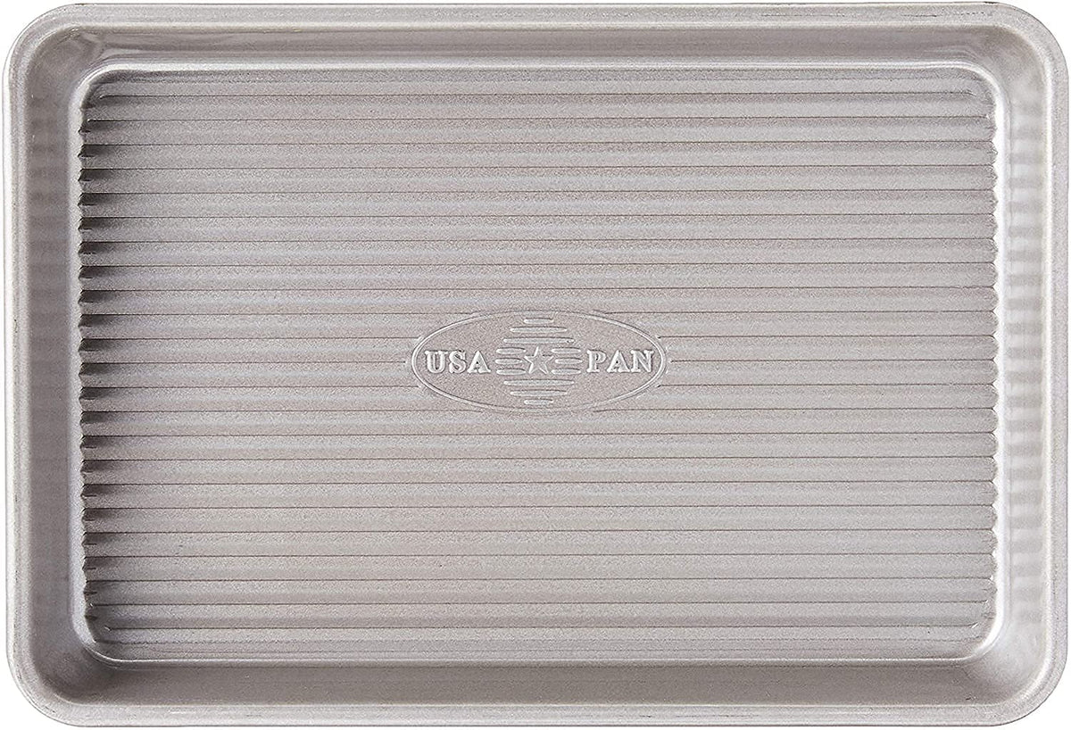 USA Pan mini sheet pan set front view highlights sturdy rim and compact size.