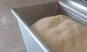 USA Pan Pullman loaf pan aluminized steel highlights heat conductivity and durability.