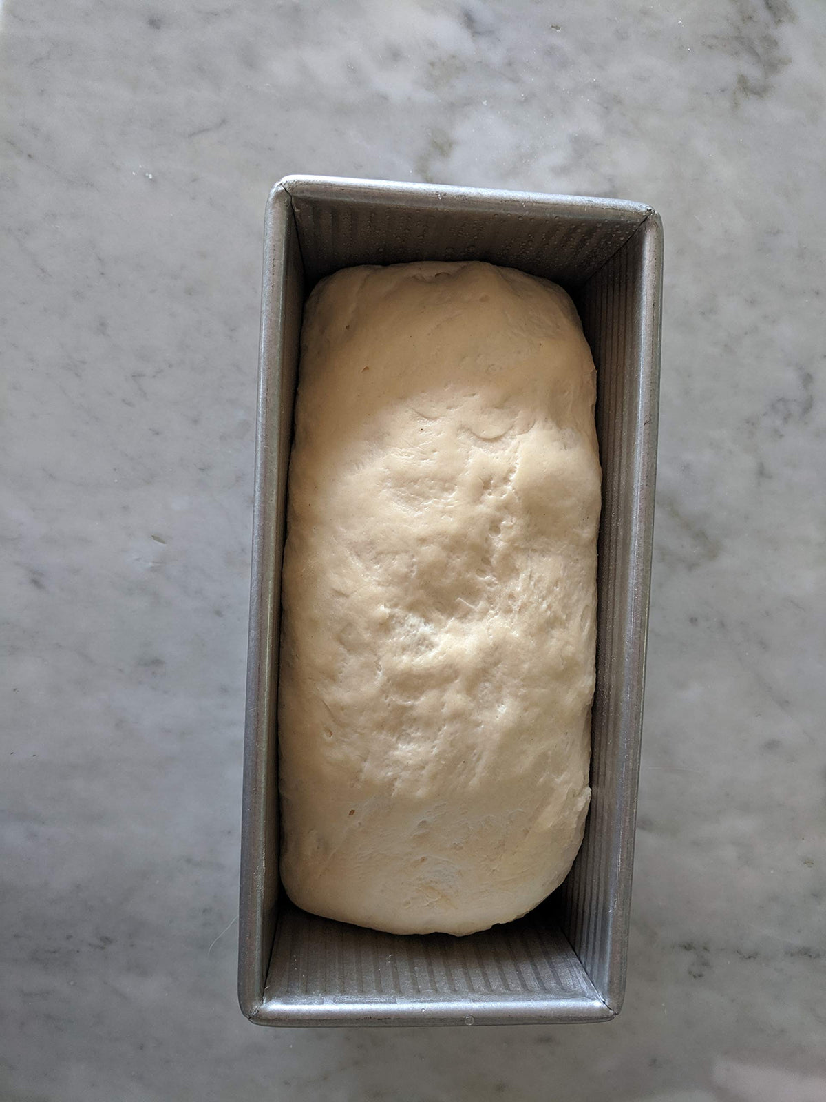 USA Pan Pullman loaf pan Americoat nonstick close-up for quick release of baked goods.