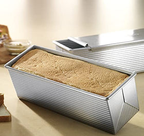 USA Pan Pullman Cover preserves moisture for sandwich bread textures.