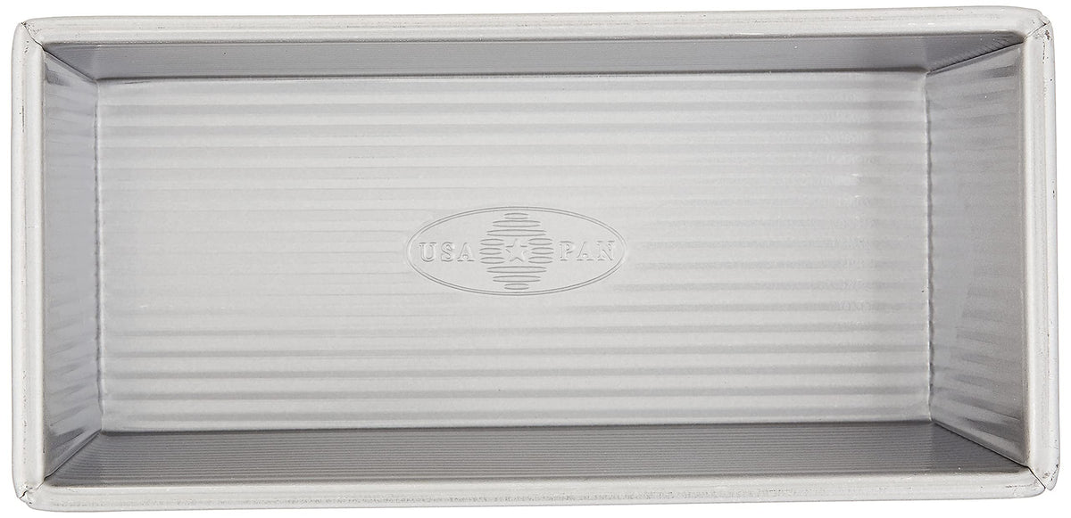 USA Pan Pullman loaf pan lid closed shows protective cover for uniform rises.