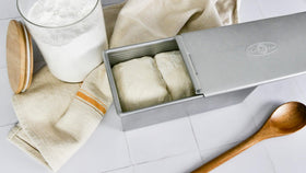 USA Pan Pullman loaf pan side view highlights sturdy design for even baking.