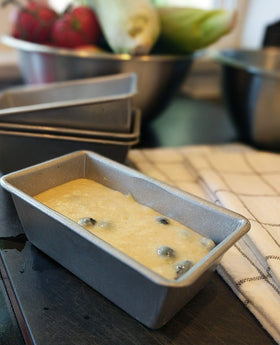 Baked mini loaves release cleanly from USA Pan thanks to quick-release design